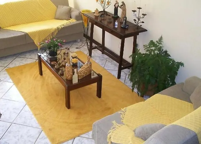 Suite Aconchegante Em